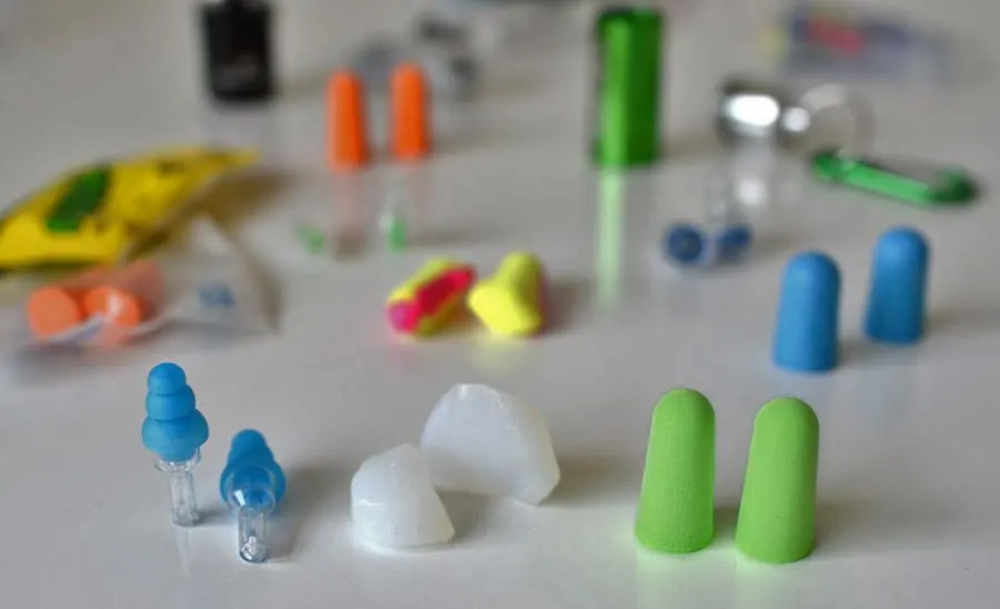 Pair of reusable music earplugs at a concert